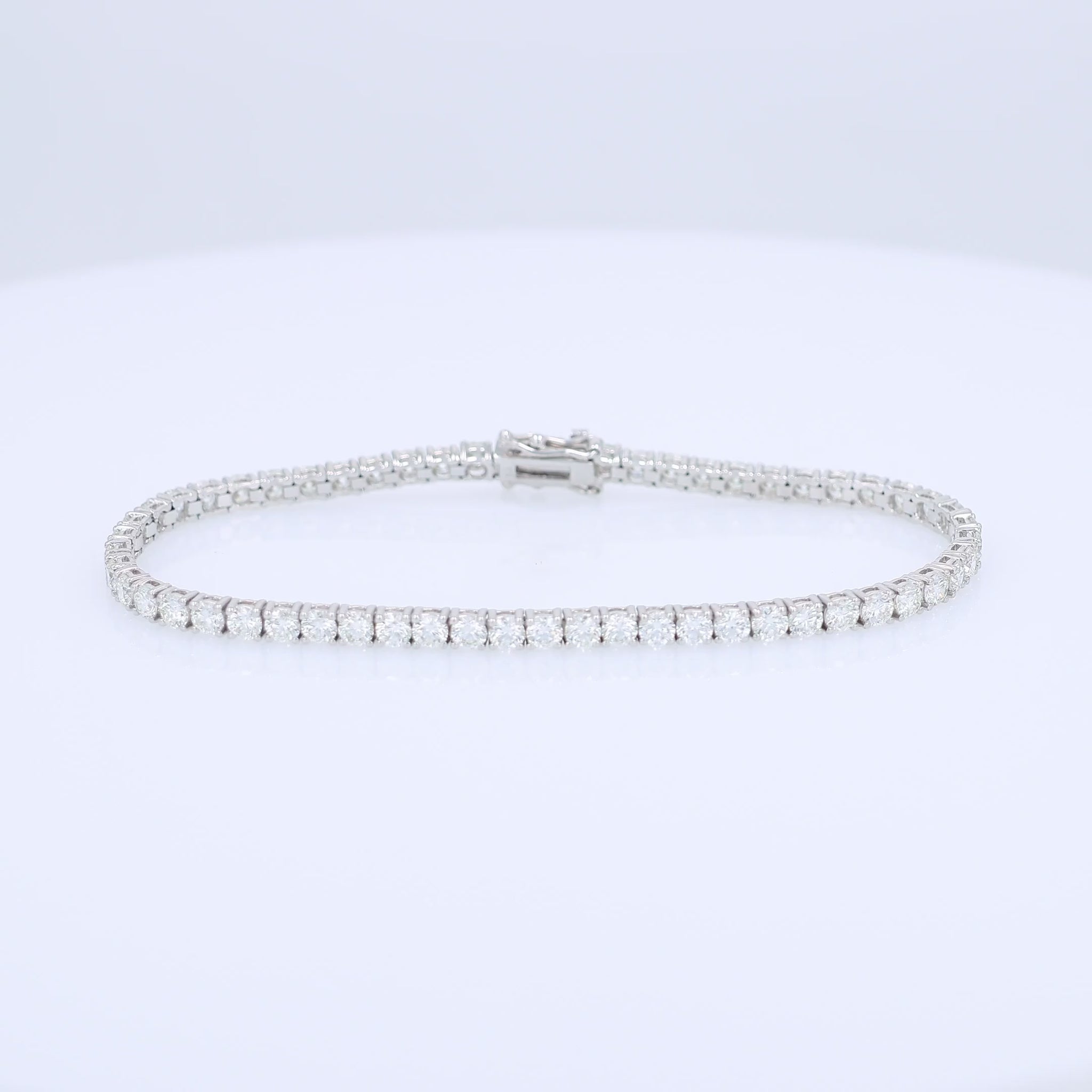 White gold 5.74 carat diamond tennis bracelet on a white background