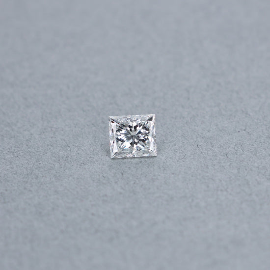 Princess cut 2.01 carat diamond graded GSI2 on a grey background
