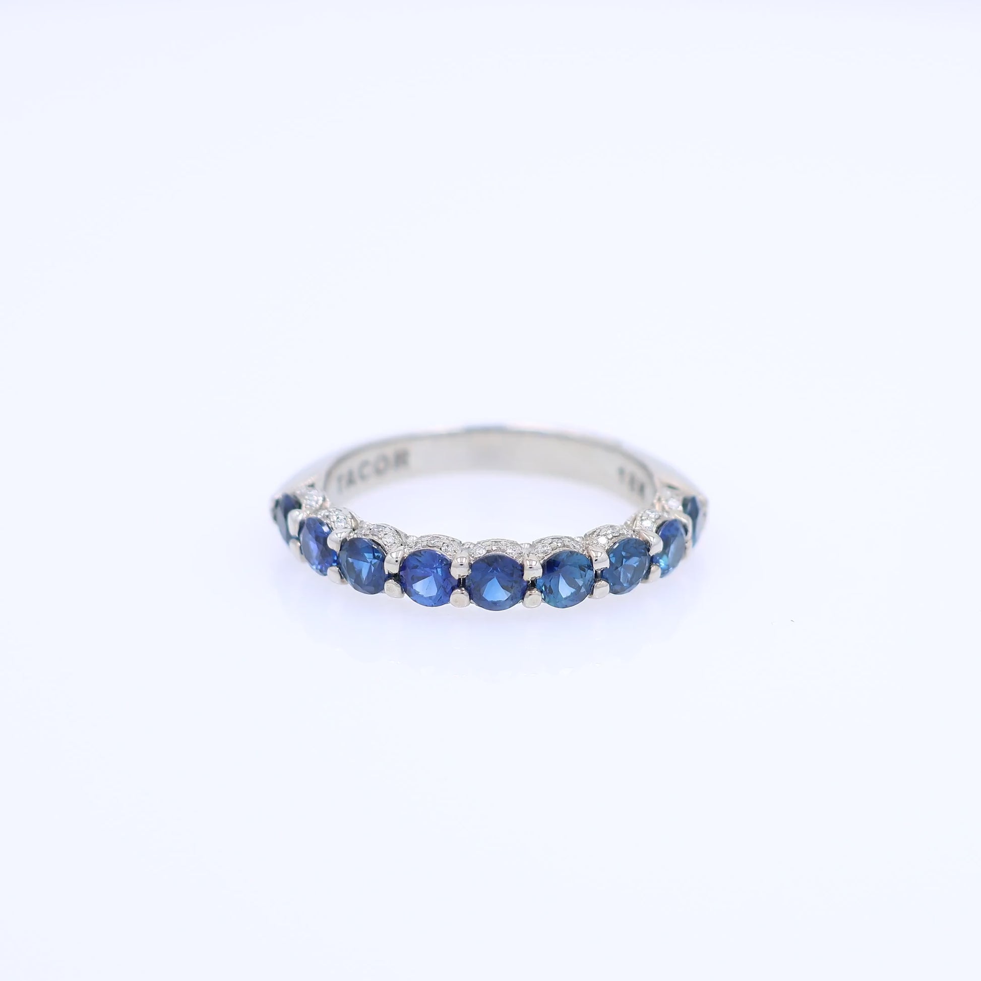 Tacori white gold sapphire and diamond halfway wedding band on a white background