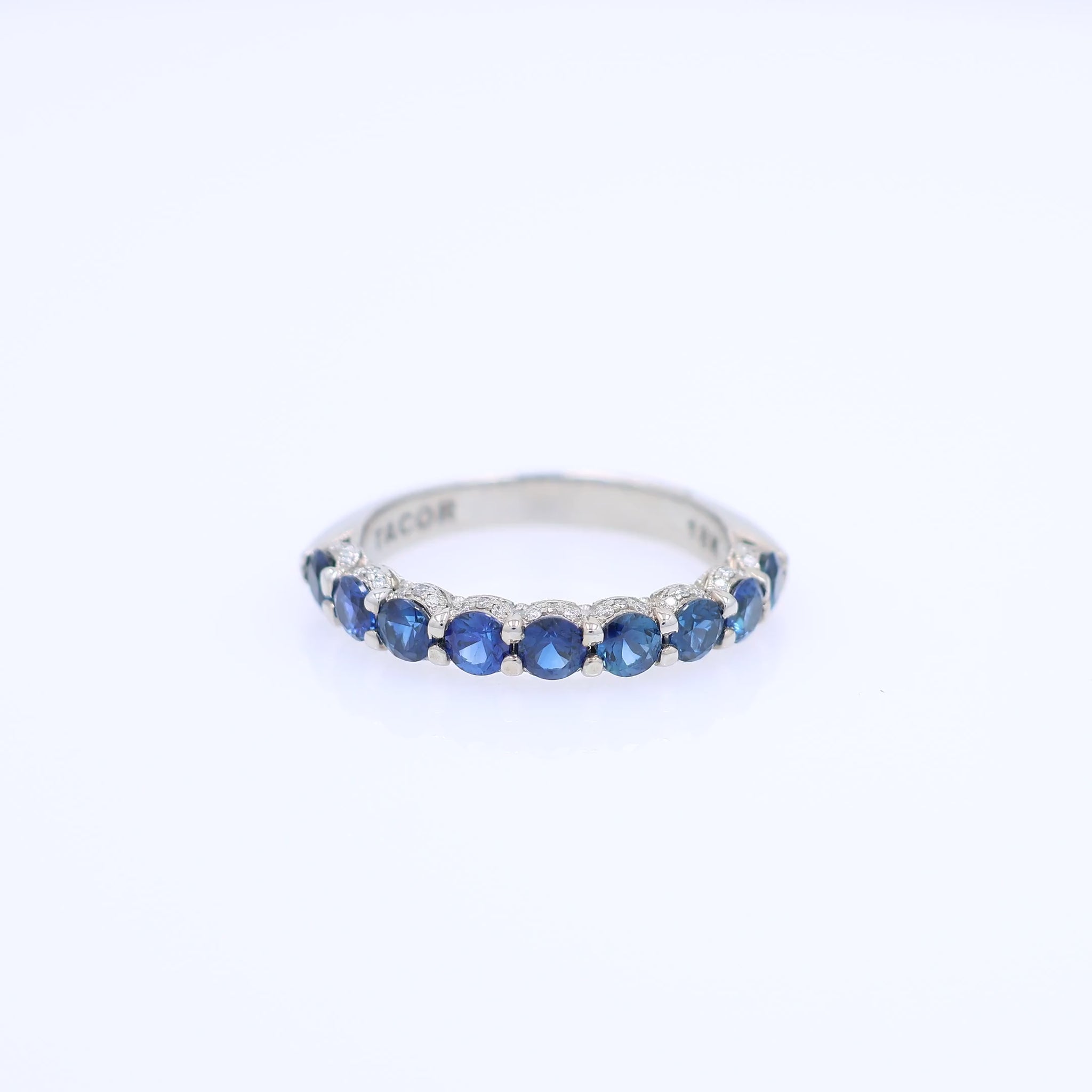 Tacori white gold sapphire and diamond halfway wedding band on a white background