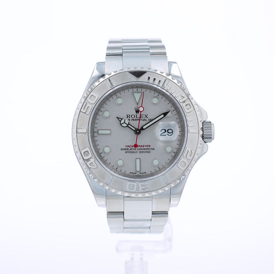 Steel Rolex watch with a platinum dial and bezel on a white background