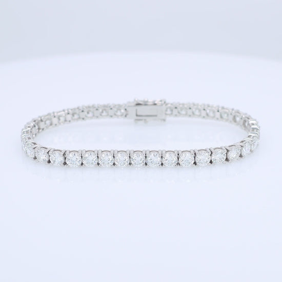 White gold 12.46 carat diamond tennis bracelet on a white background