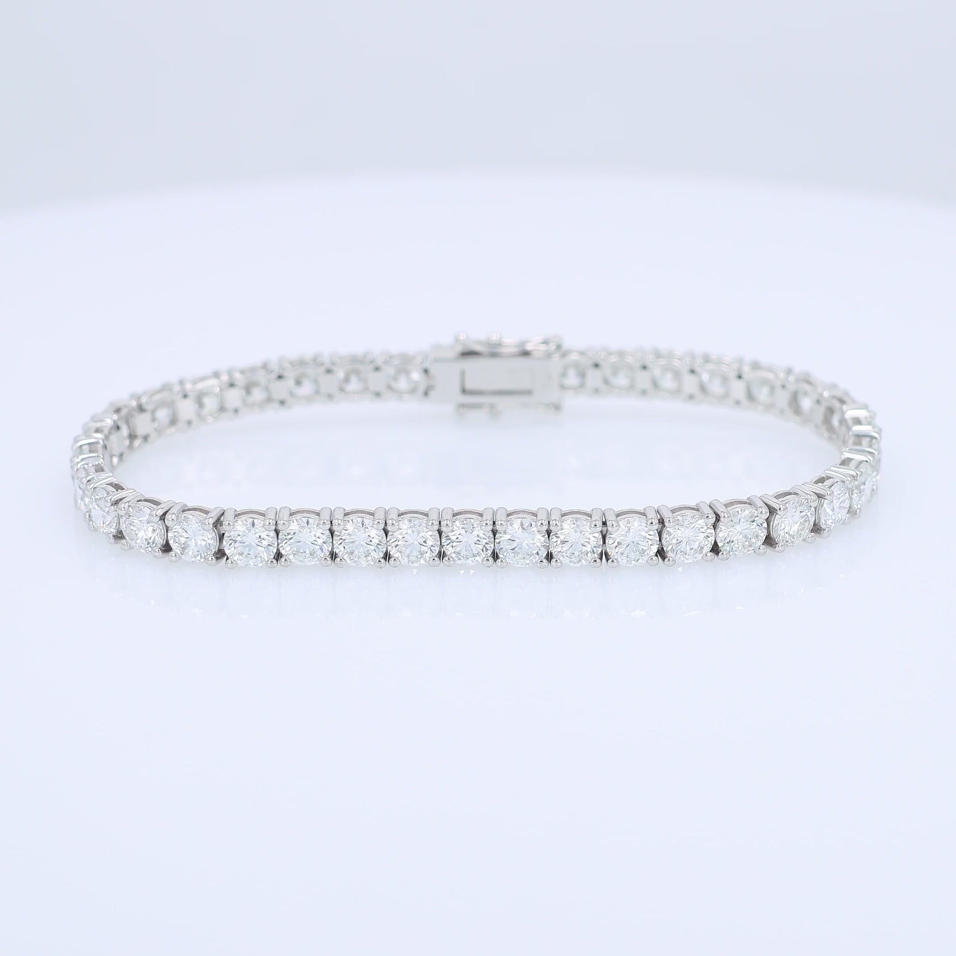 White gold 12.46 carat diamond tennis bracelet on a white background
