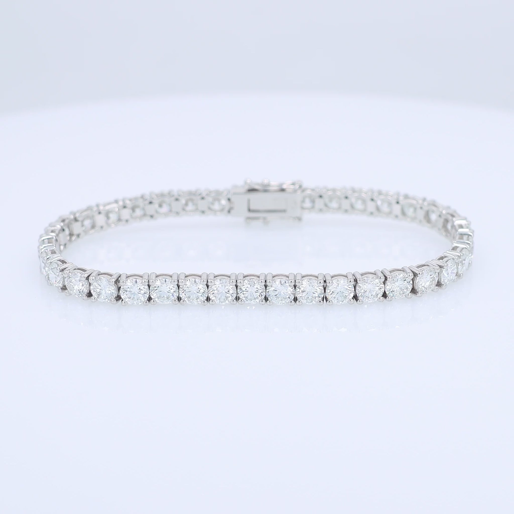White gold 12.46 carat diamond tennis bracelet on a white background