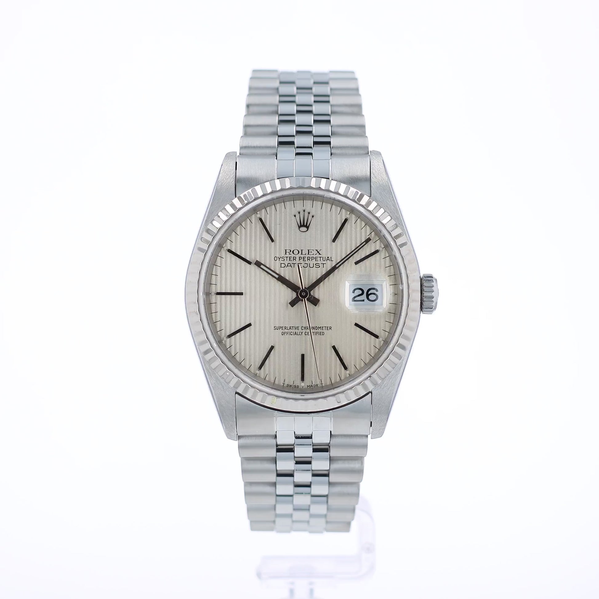 360 degree video of a Rolex watch with a silver tapestry dial and a white gold fluted bezel on a white background