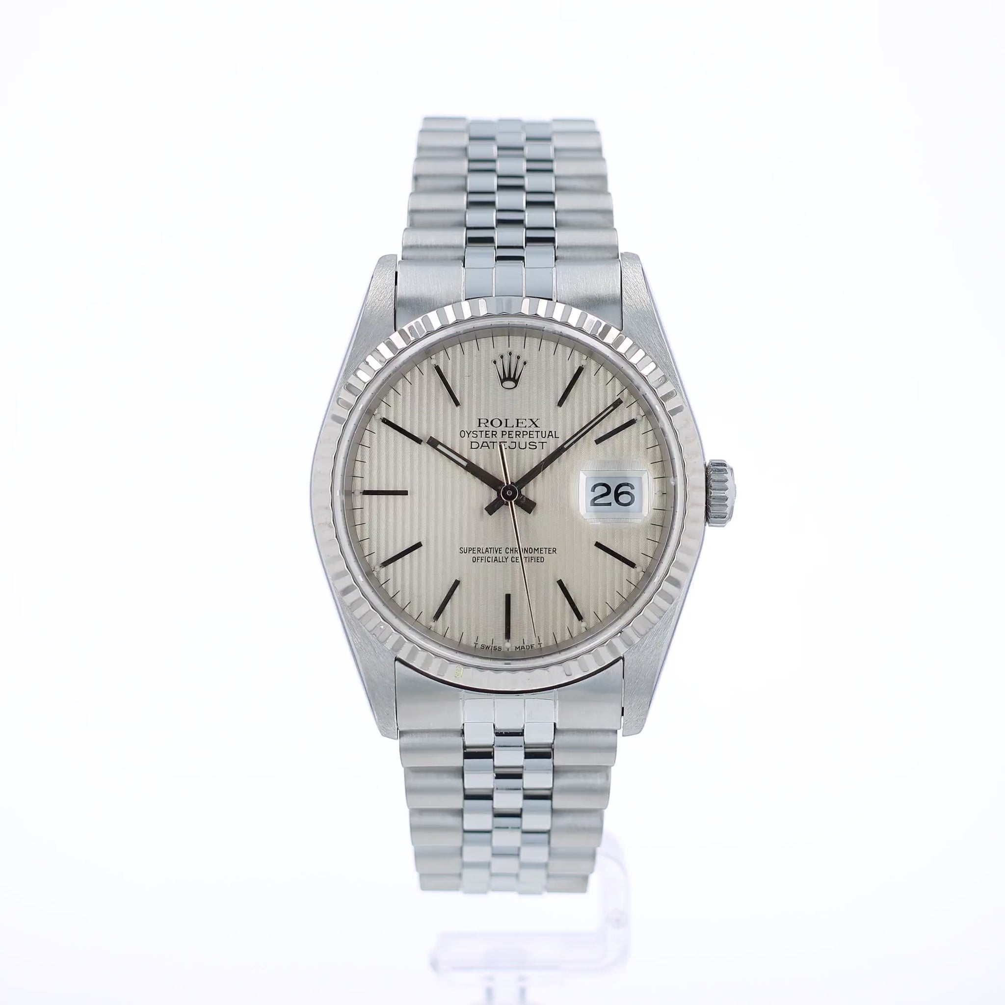 360 degree video of a Rolex watch with a silver tapestry dial and a white gold fluted bezel on a white background