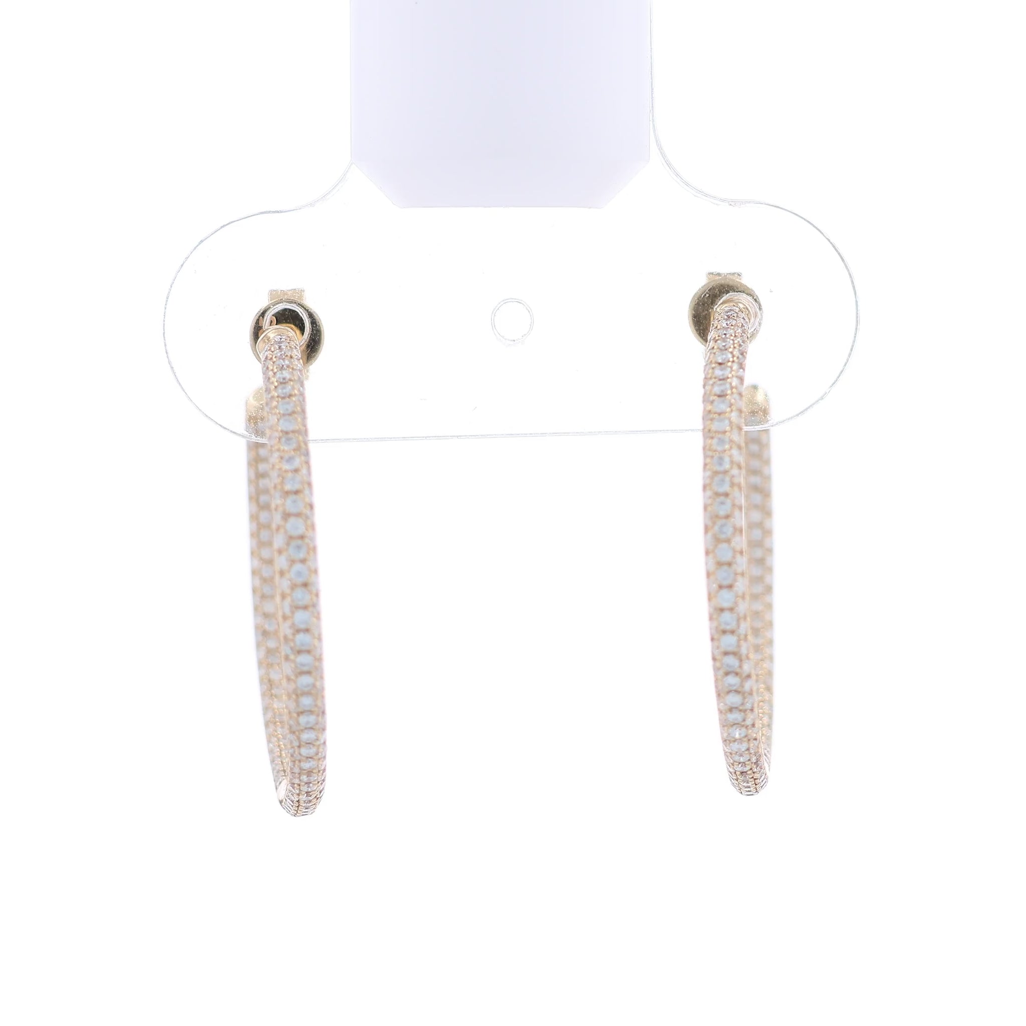 Yellow gold inside & out pave diamond hoop earrings on a white background