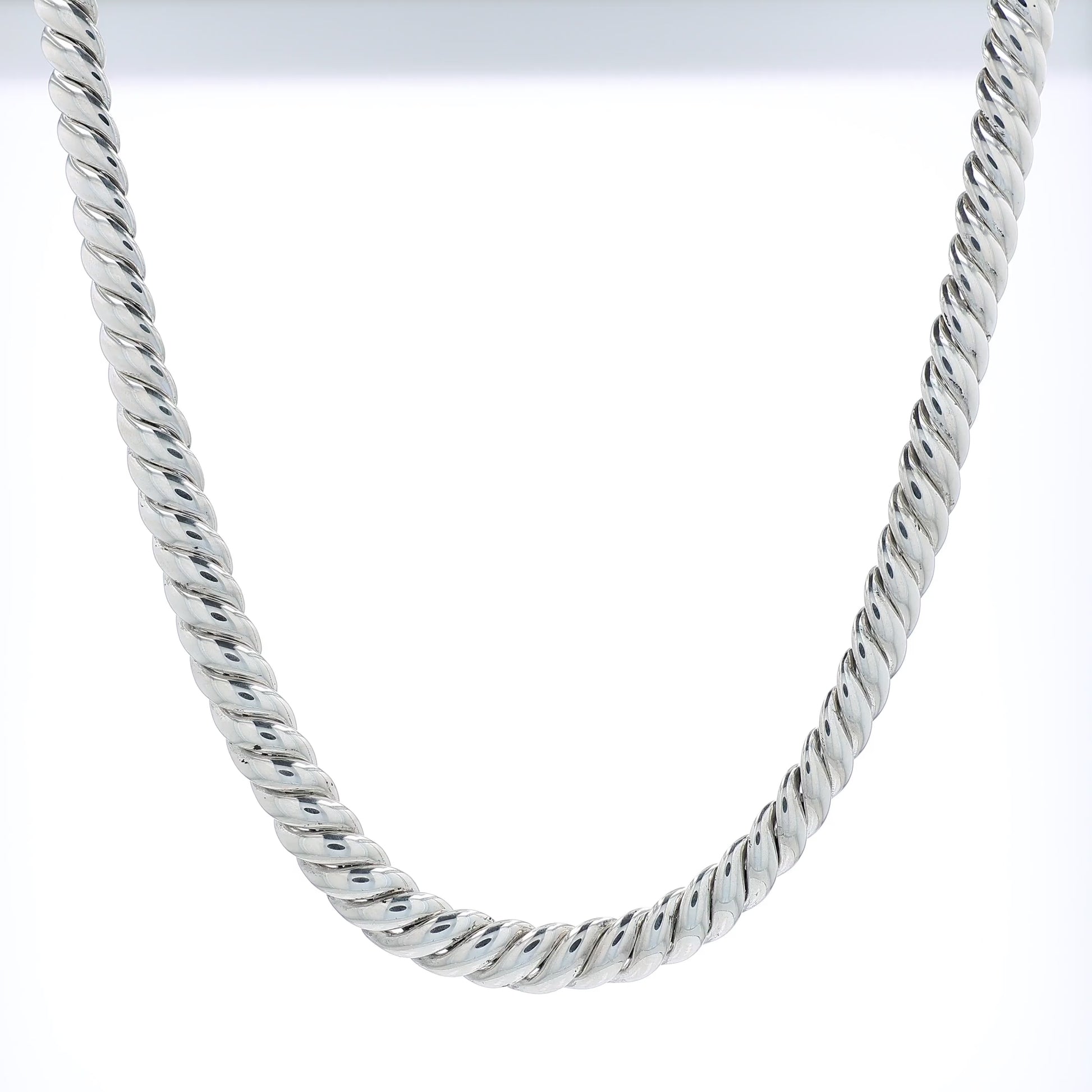 Sterling silver David Yurman chain link necklace on a white background