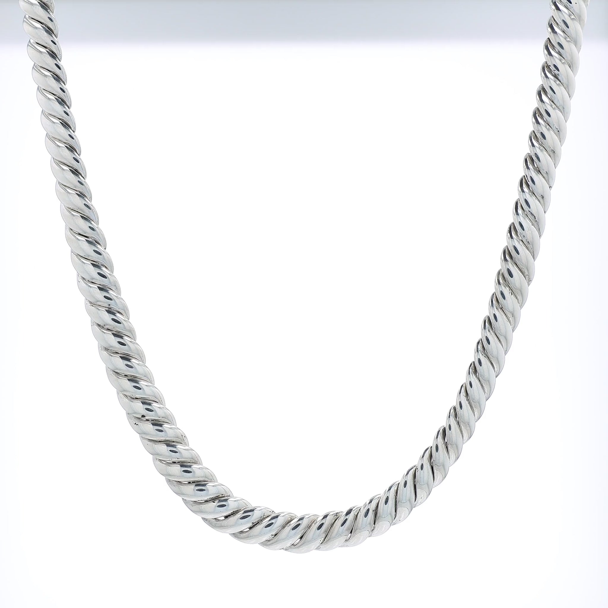 Sterling silver David Yurman chain link necklace on a white background