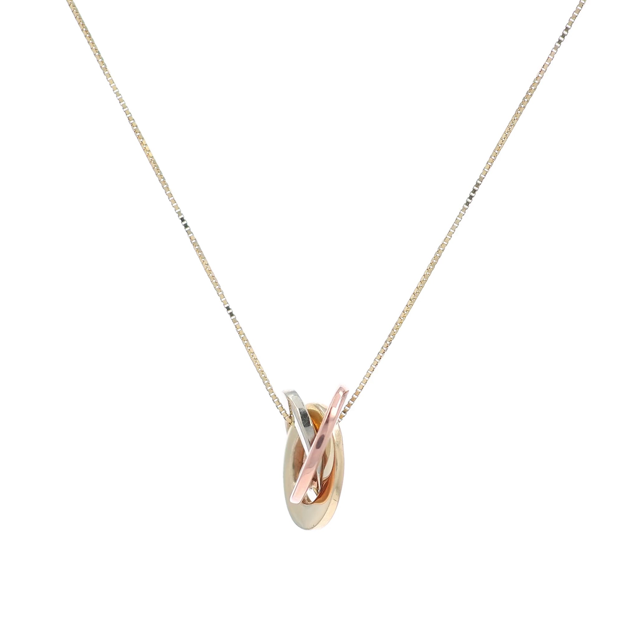 A three-tone metal pendant necklace featuring interlocking rings in yellow gold, rose gold, and silver, suspended from a delicate gold chain against a white background.