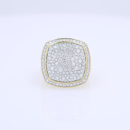 A video of a yellow gold David Yurman signet ring featuring a square-shaped pavé diamond face and a twisted cable band, set against a clean white background.