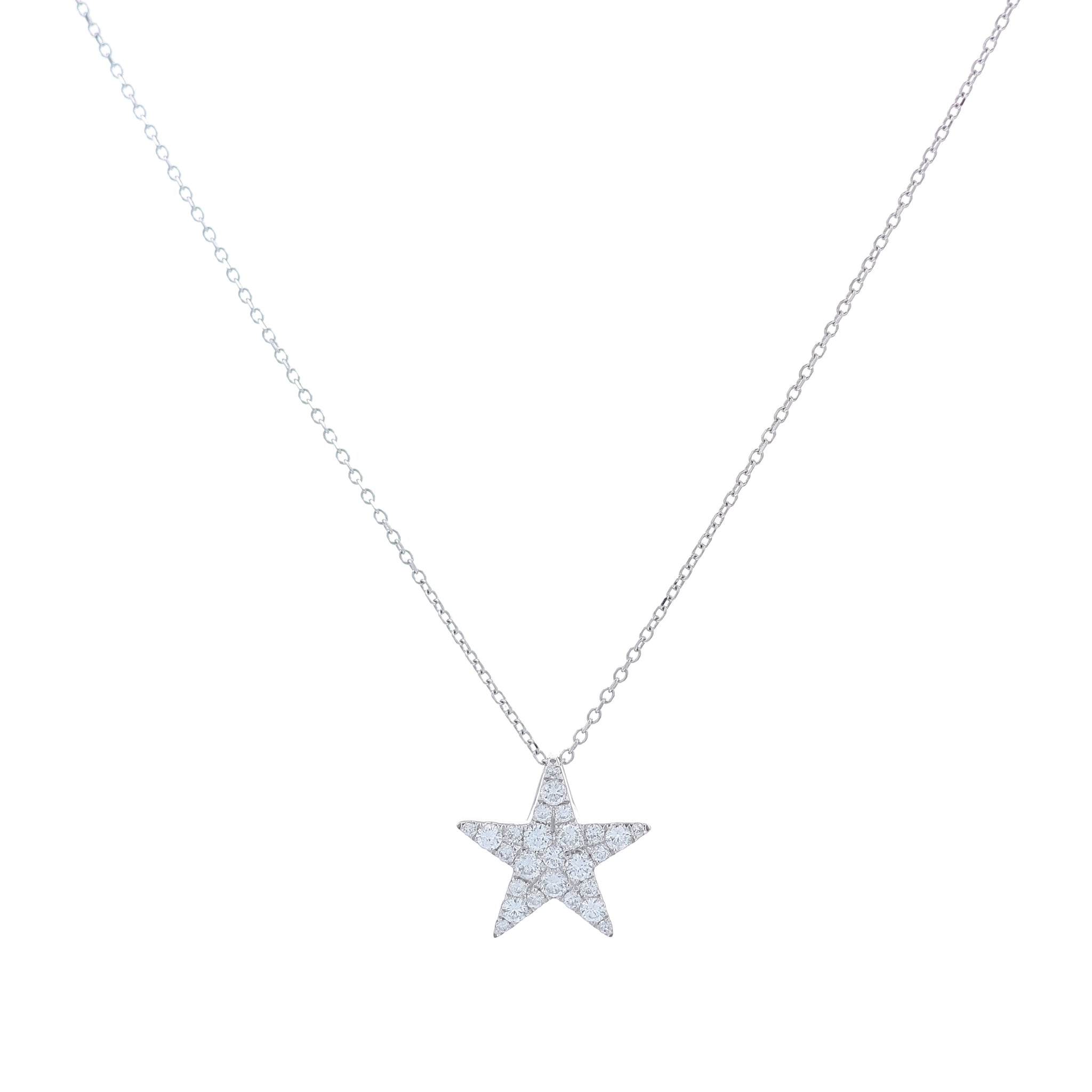 White gold star design pave diamond pendant necklace on a white background