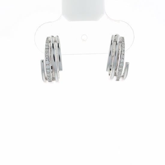 A video of a pair of white gold wrap-around hoop earrings with rows of small clear stones, shown at various angles on a clean white background
