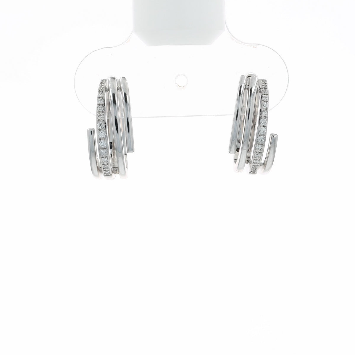A video of a pair of white gold wrap-around hoop earrings with rows of small clear stones, shown at various angles on a clean white background