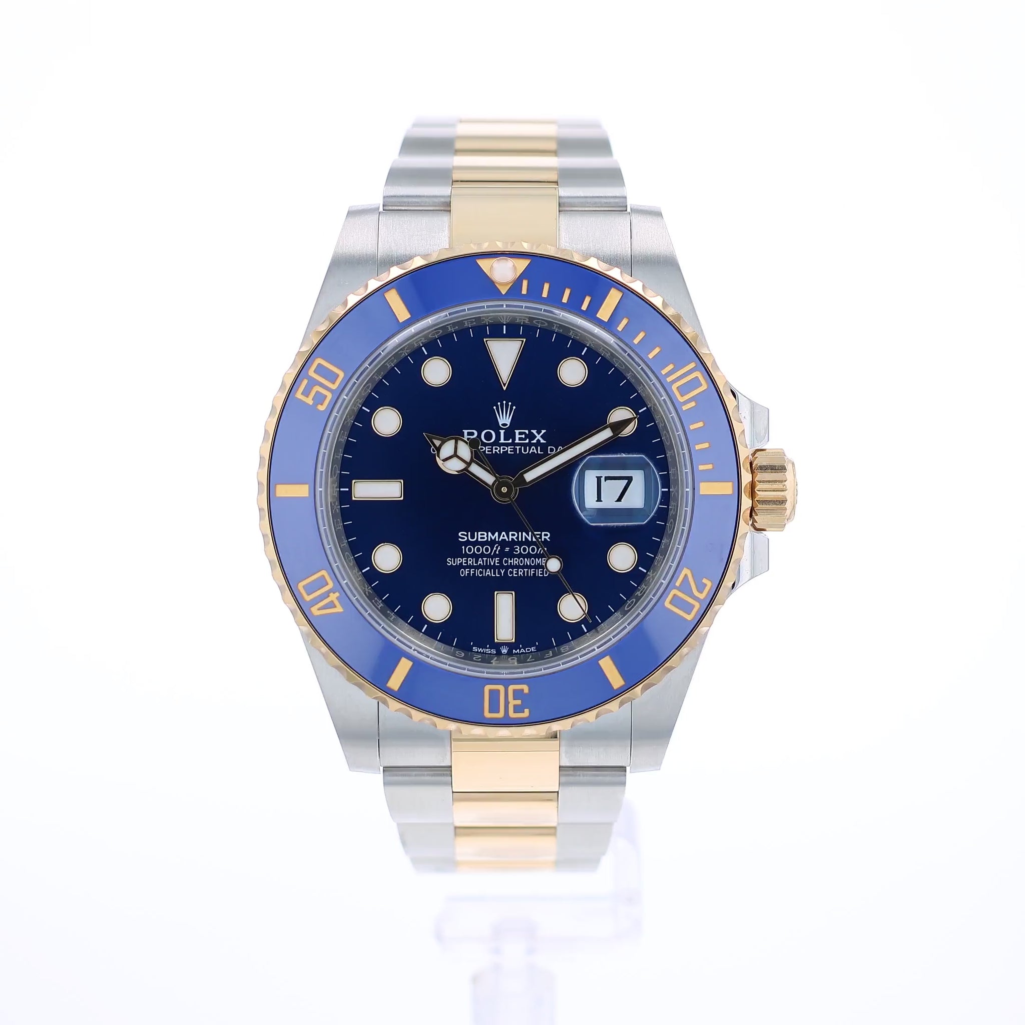 360 degree video of a two-tone Rolex Submariner watch with blue dial and ceramic bezel on a white background