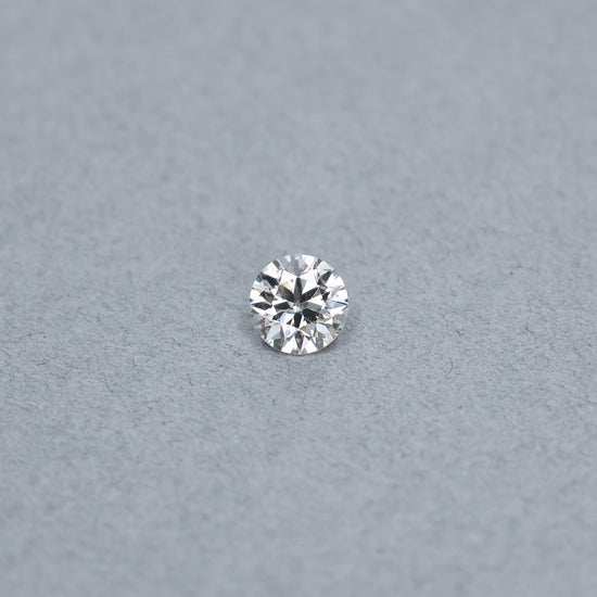Old european cut 1.54 carat diamond graded LSI1 on a grey background