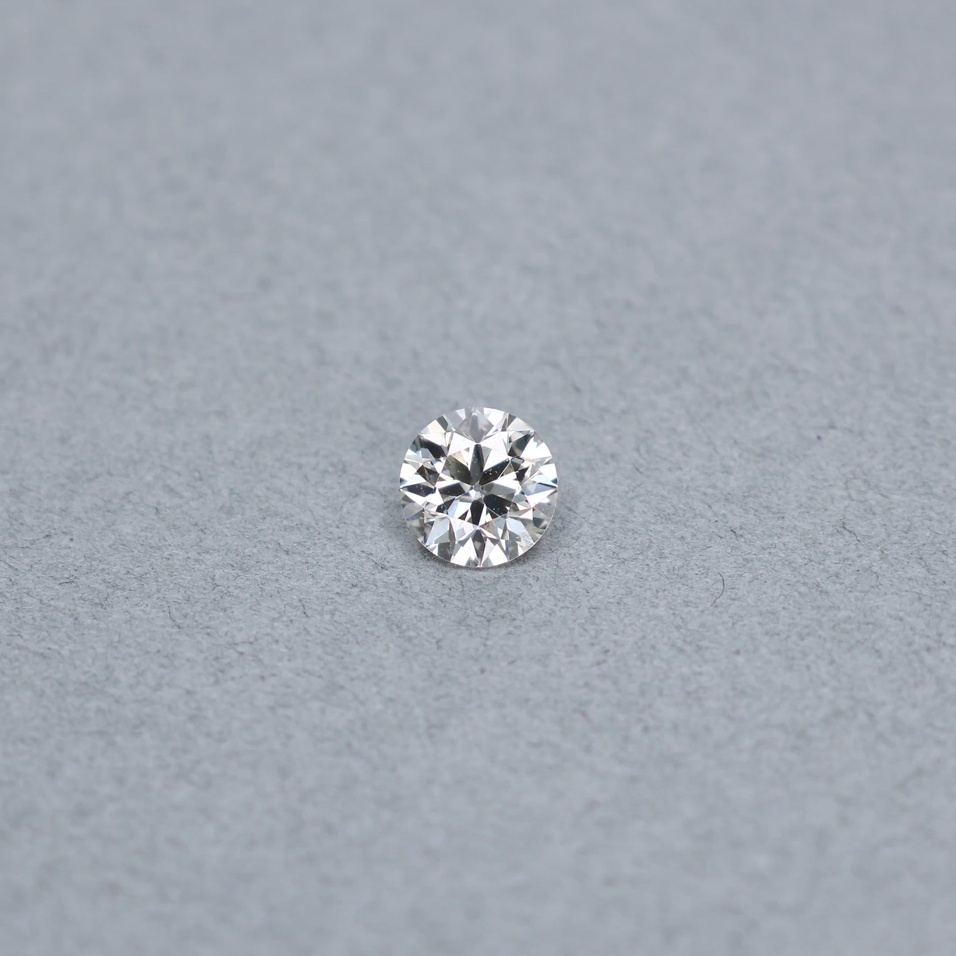 Old european cut 1.54 carat diamond graded LSI1 on a grey background