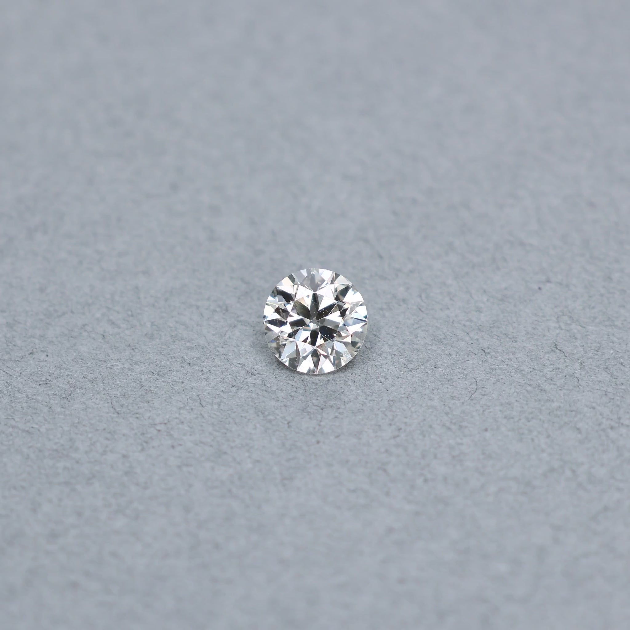 Old european cut 1.54 carat diamond graded LSI1 on a grey background