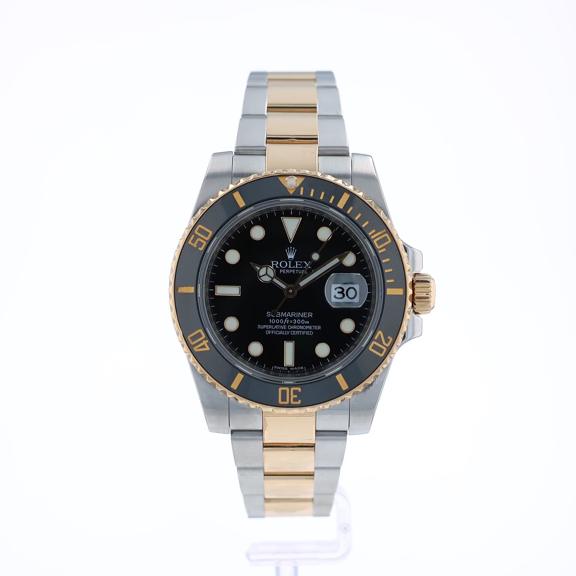 360 degree video of a two-tone Steel and gold Rolex Submariner watch with a black dial and bezel on a white background