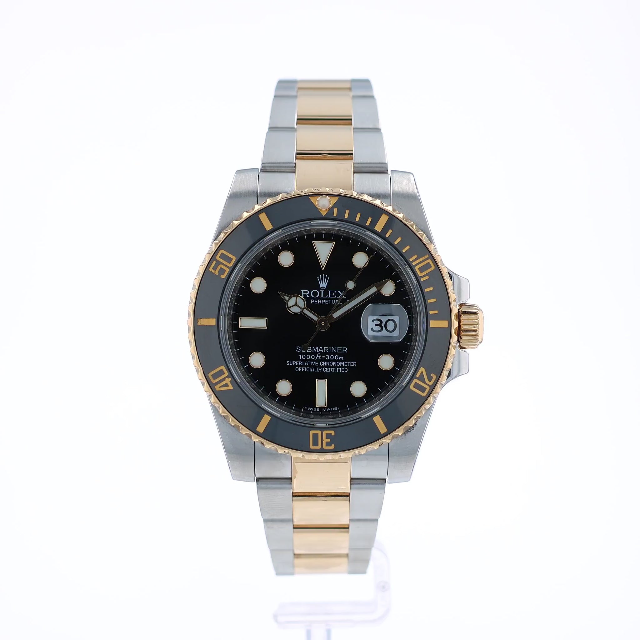 360 degree video of a two-tone Steel and gold Rolex Submariner watch with a black dial and bezel on a white background