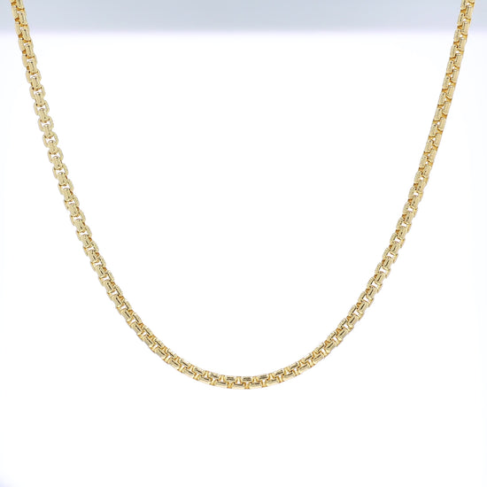 Yellow golf 3.8mm polished box link chain necklace on a white background