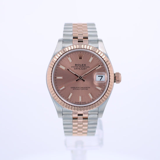 360 video of a rose gold and steel Rolex watch with a pink dial on a white background