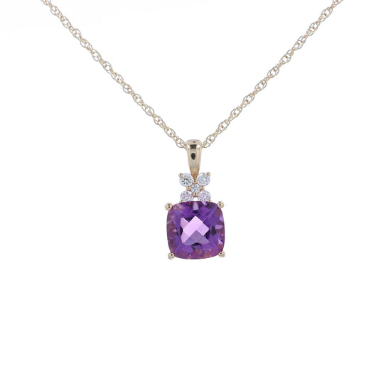 A video of a gold necklace with a cushion-cut purple amethyst pendant and small clear accent stones, shown at various angles on a clean white background.