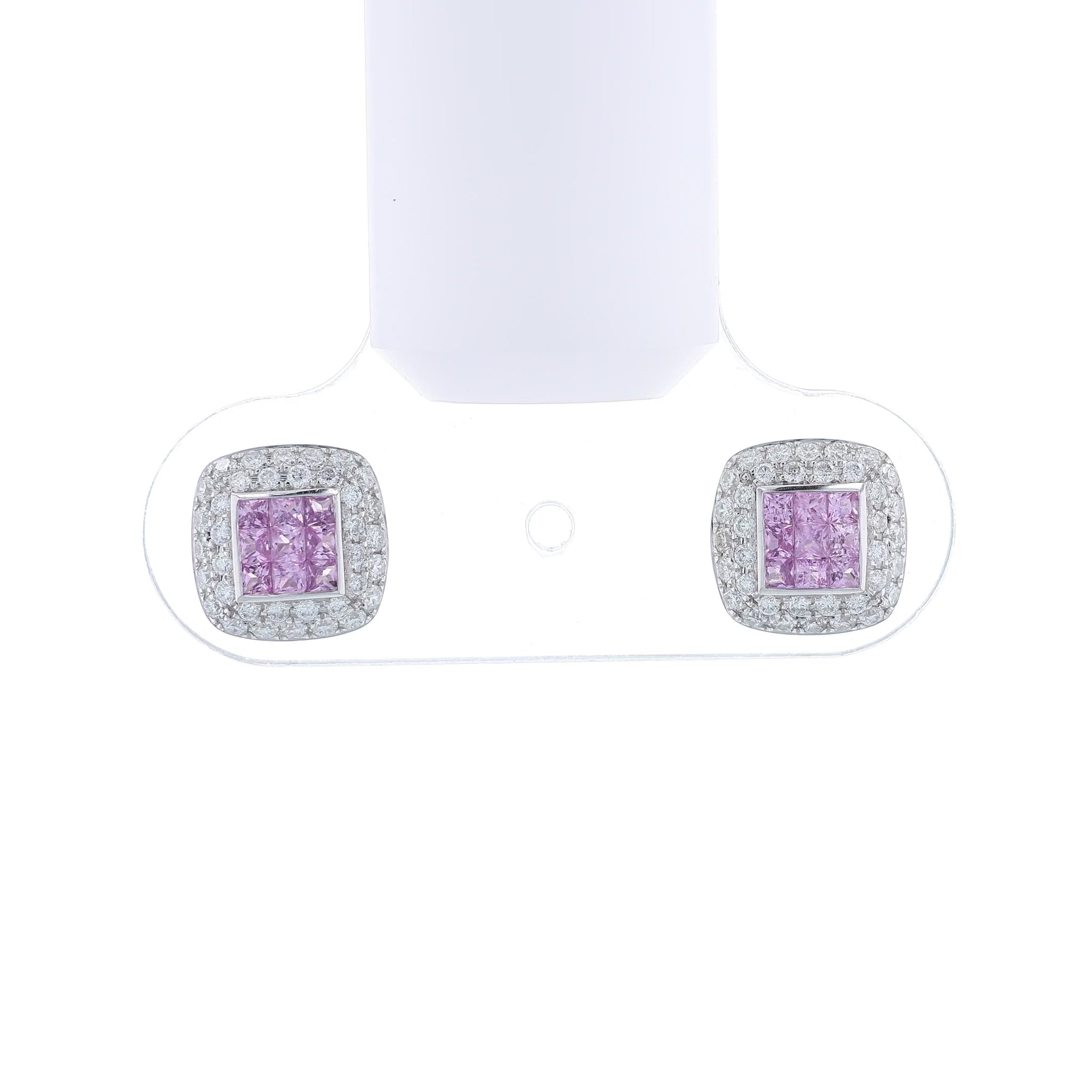 White gold cushion diamond and pink sapphire stud earrings on a white background