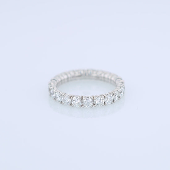 Platinum diamond eternity band on a white background