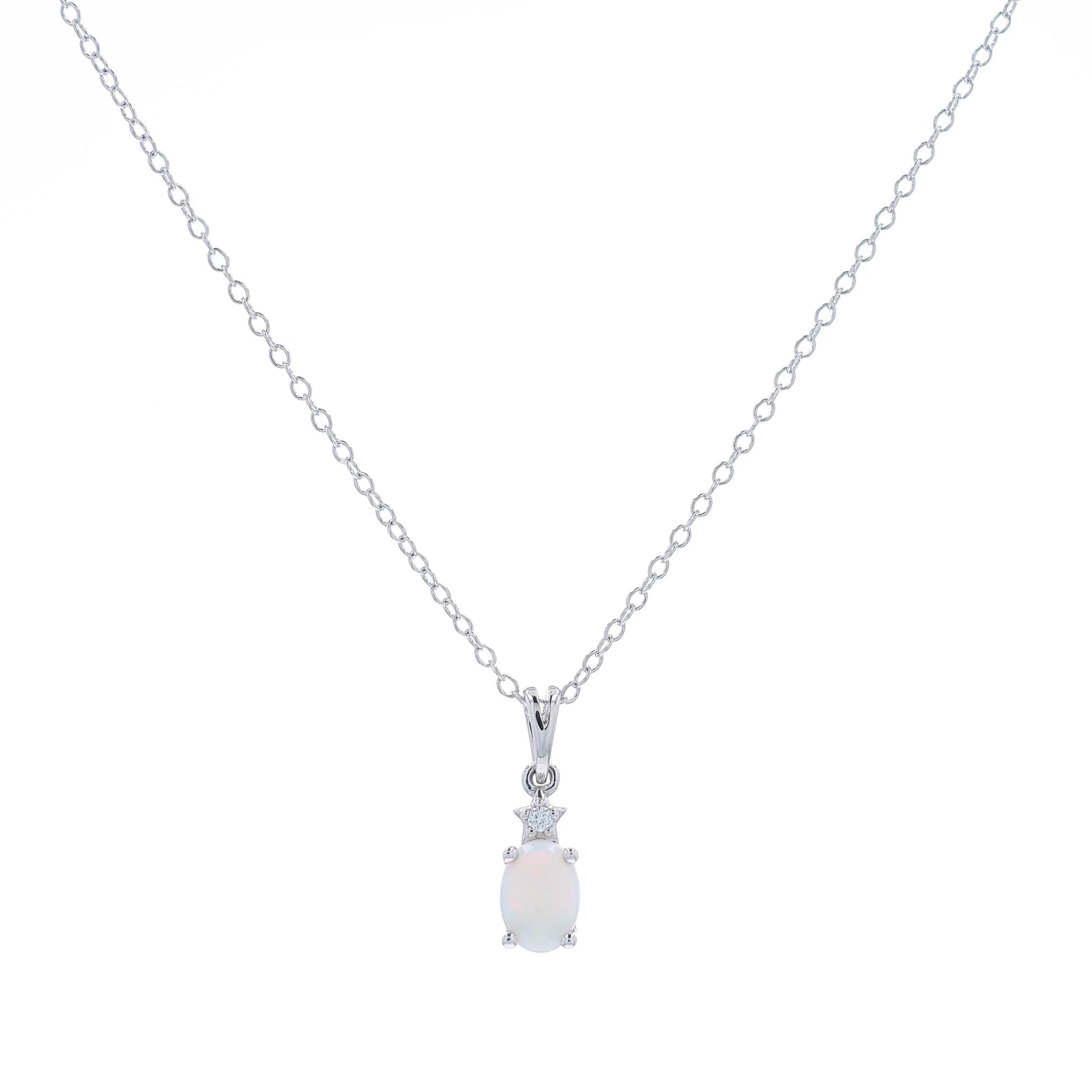 White gold oval opal and diamond pendant necklace on a white background