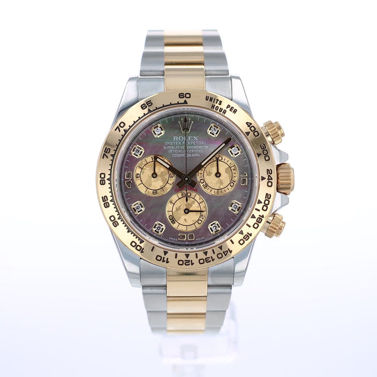 360 degree video of a two-tone Rolex watch with a grey mother of pearl dial and gold sub dials on a white background