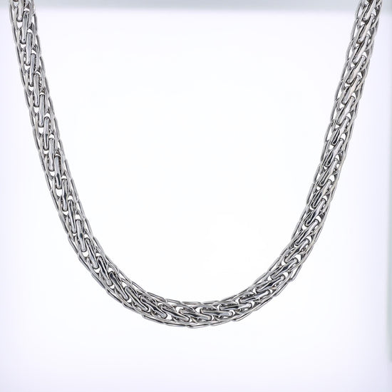 White gold braided intertwined link chain necklace on a white background