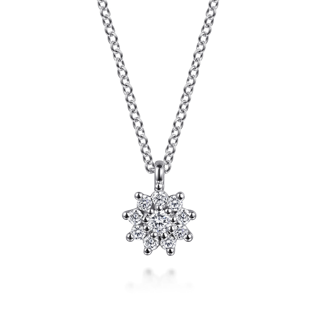 white gold pendant necklace on white background