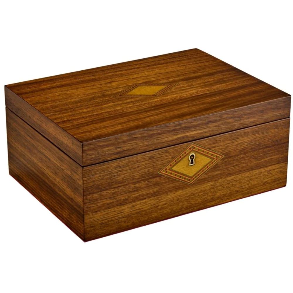 Wooden jewelry box with a decorative emblem 