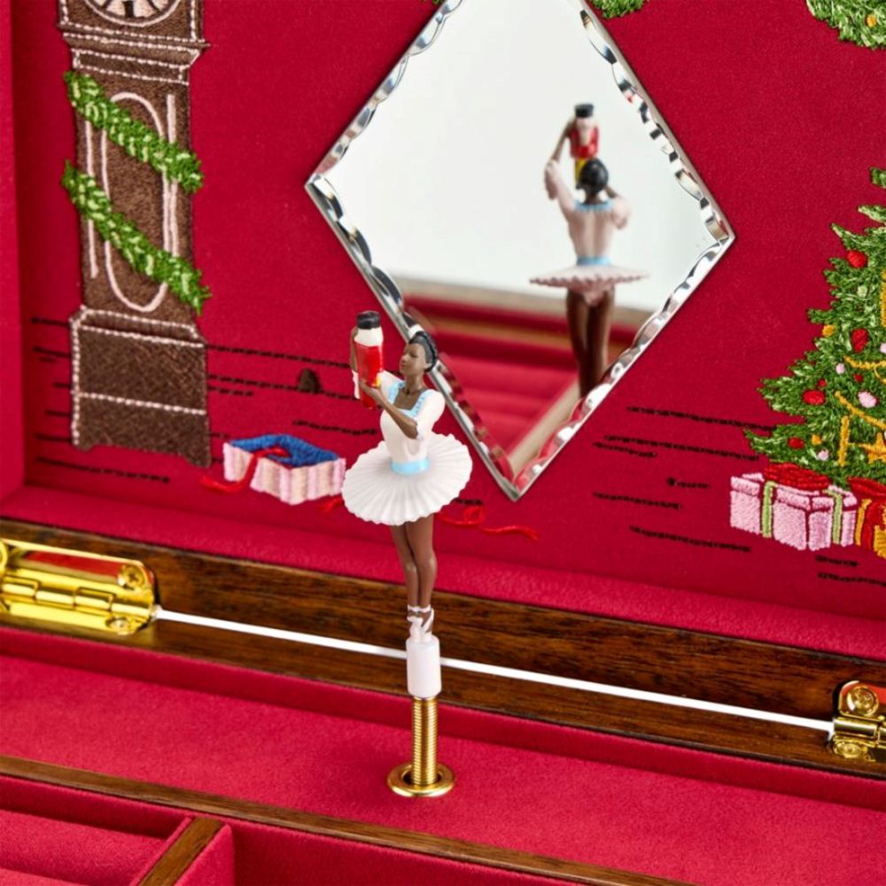 Decorative jewelry box with a ballerina figurine, mirror, and Christmas-themed design.