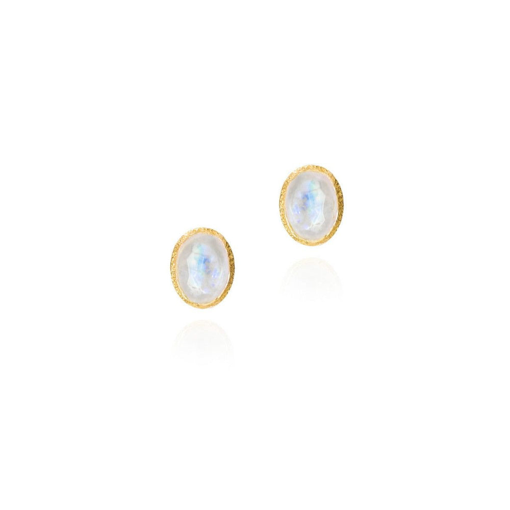 white stones in gold frames on white background