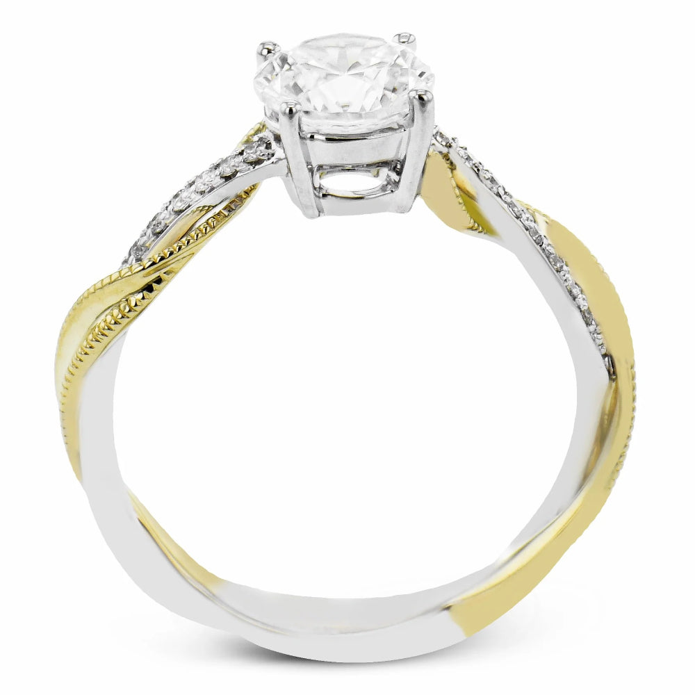 Two-tone gold and silver ring with a large diamond on white background
