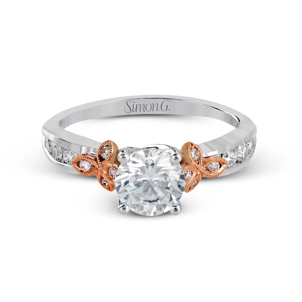 Diamond ring with rose gold accents and 'Simon G.' branding on a white background