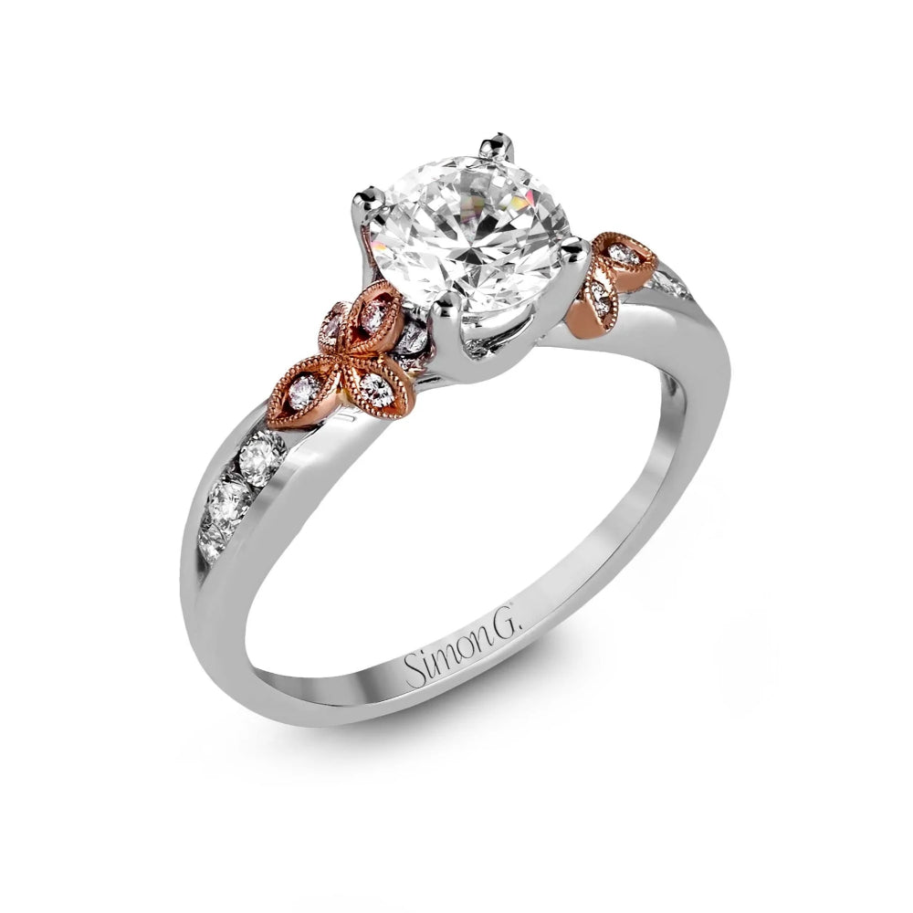 Diamond ring with rose gold accents on a white background