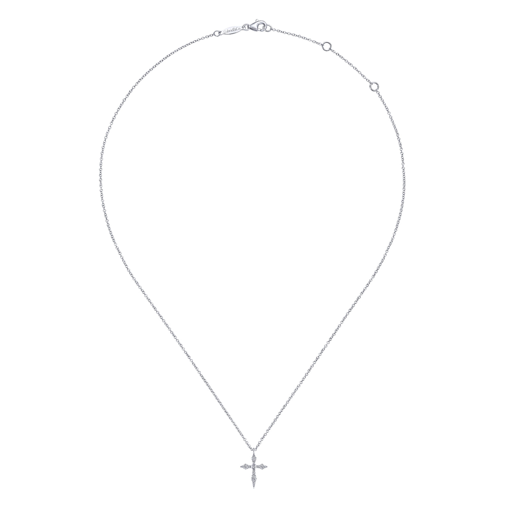 Silver necklace with a cross pendant on a white background
