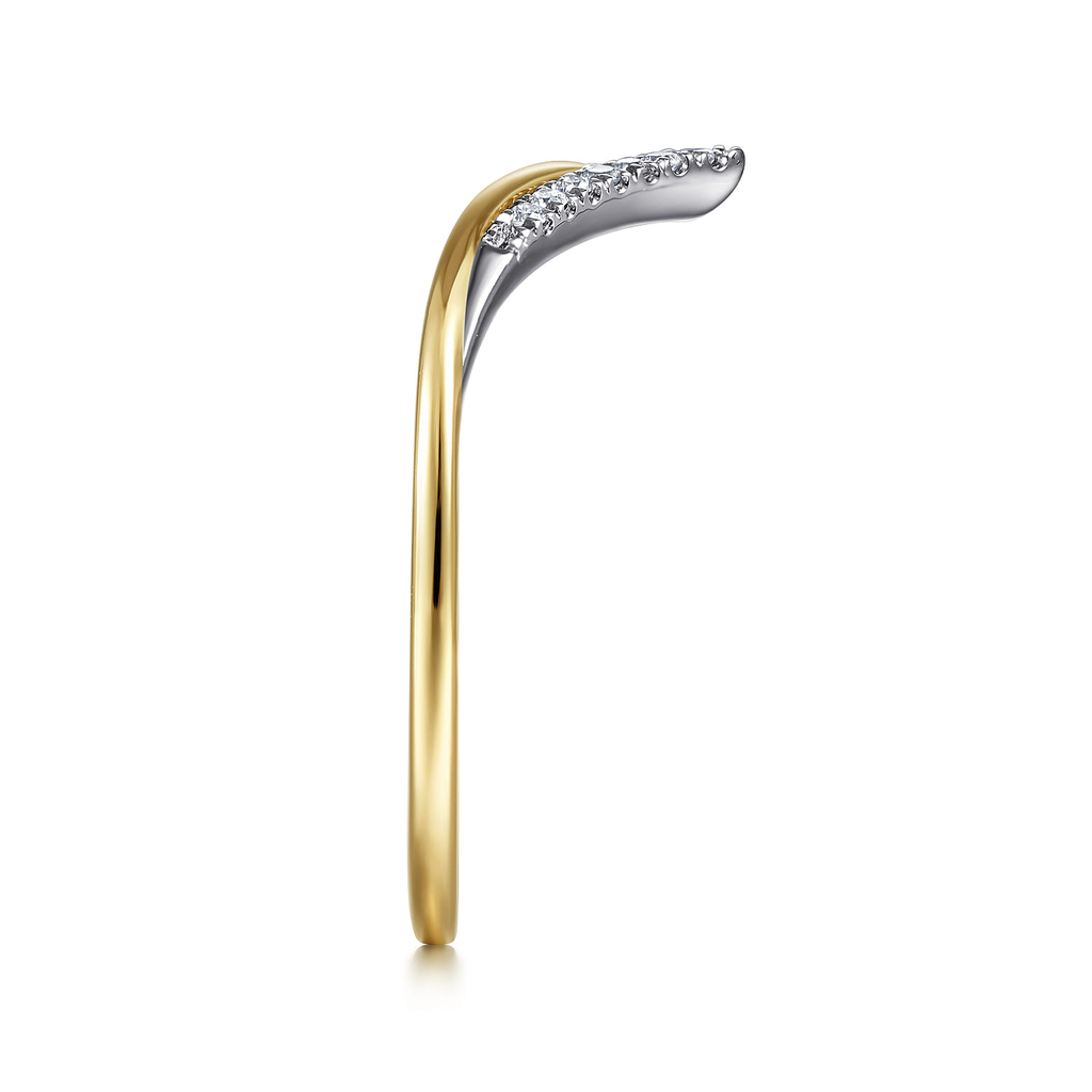 Gold and silver curved earring with embedded diamonds on a white background