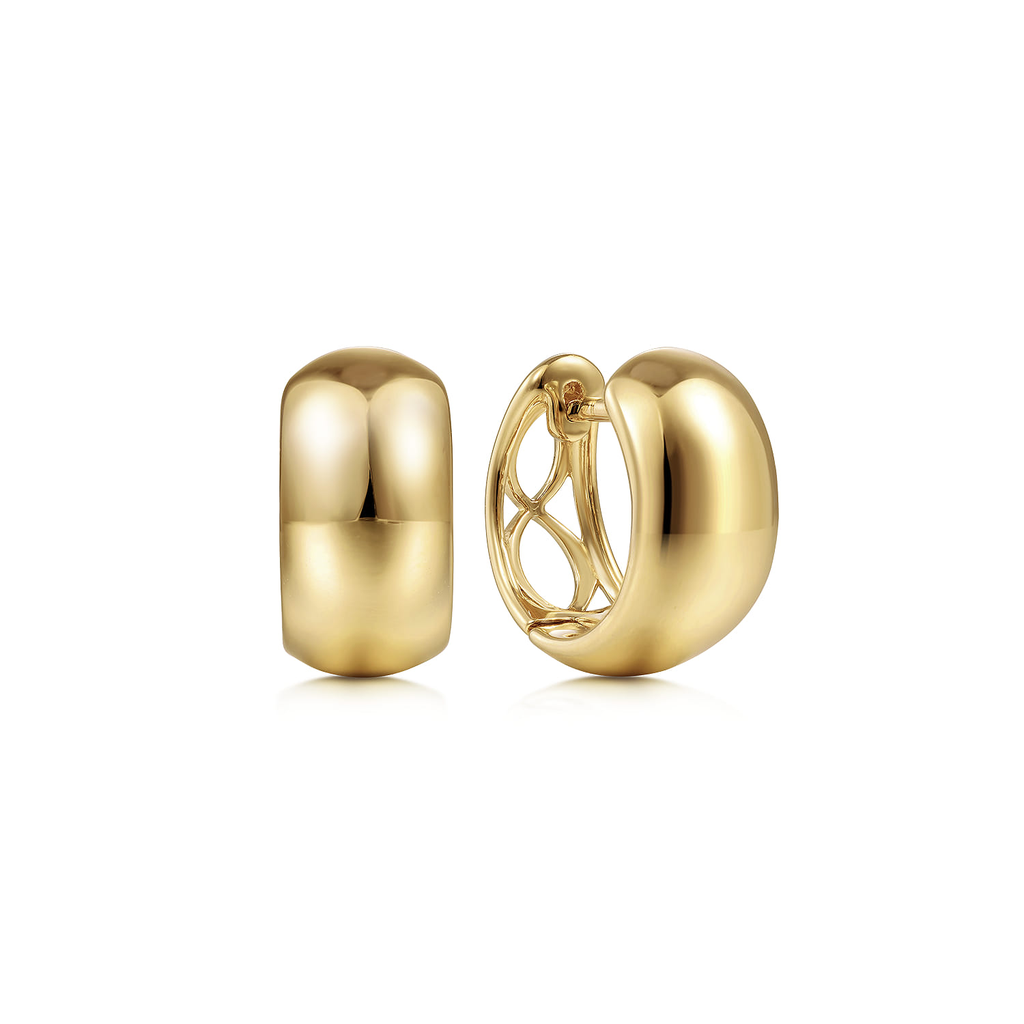 Two gold hoop earrings on a white background