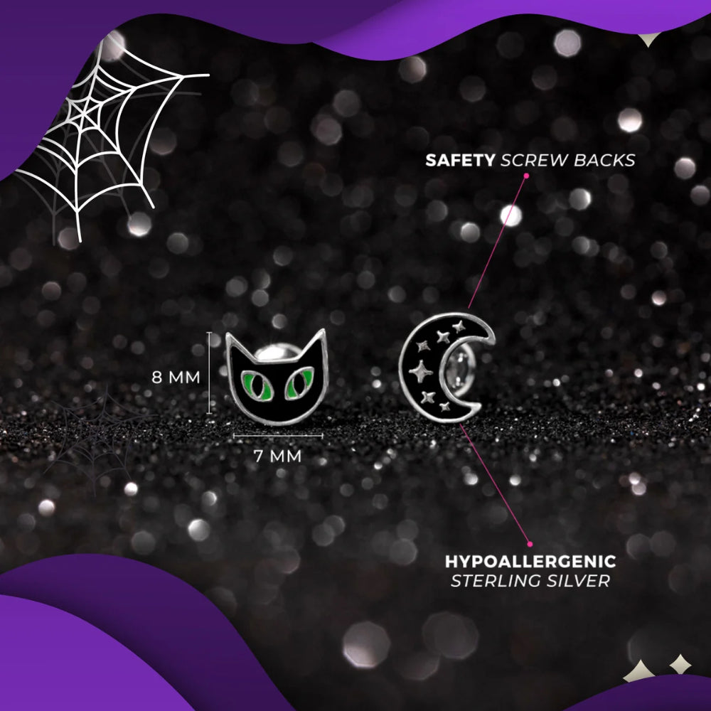 Silver cat and crescent moon earrings with green eyes, shown on a black glittery background with purple decorative borders. White text labels indicate 8 mm and 7 mm sizes, safety screw backs, and hypoallergenic sterling silver.