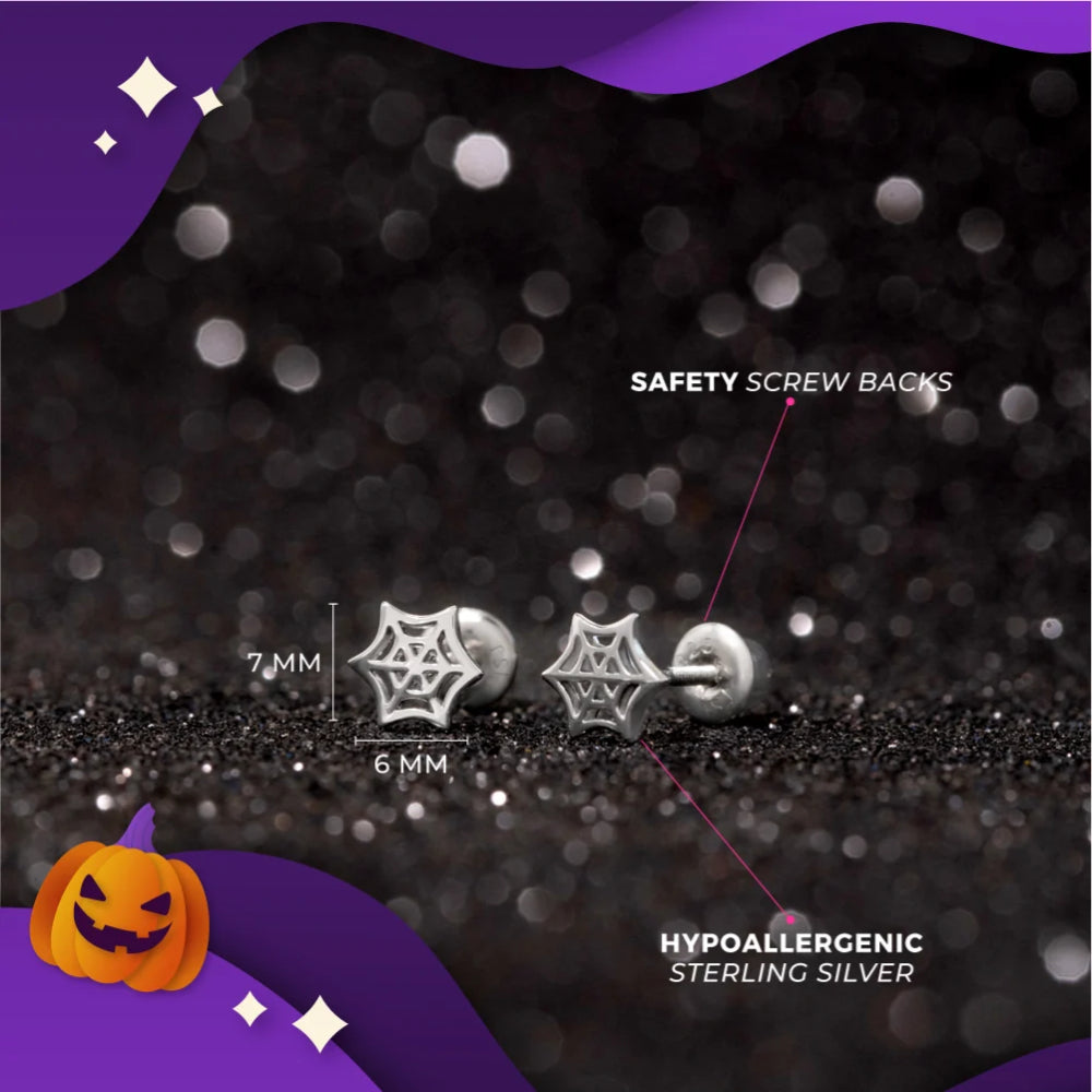 Spider-shaped stud earrings in sterling silver with safety screw backs, shown on a dark glittery background with measurement labels (7mm and 6mm) and text noting hypoallergenic material.