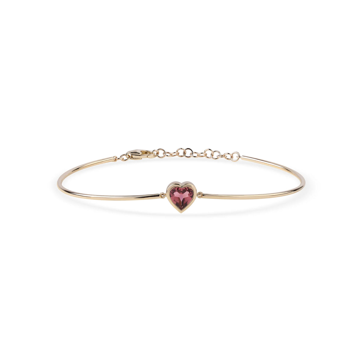 gold-tone bracelet with pink heart shape center stone on a clean white background