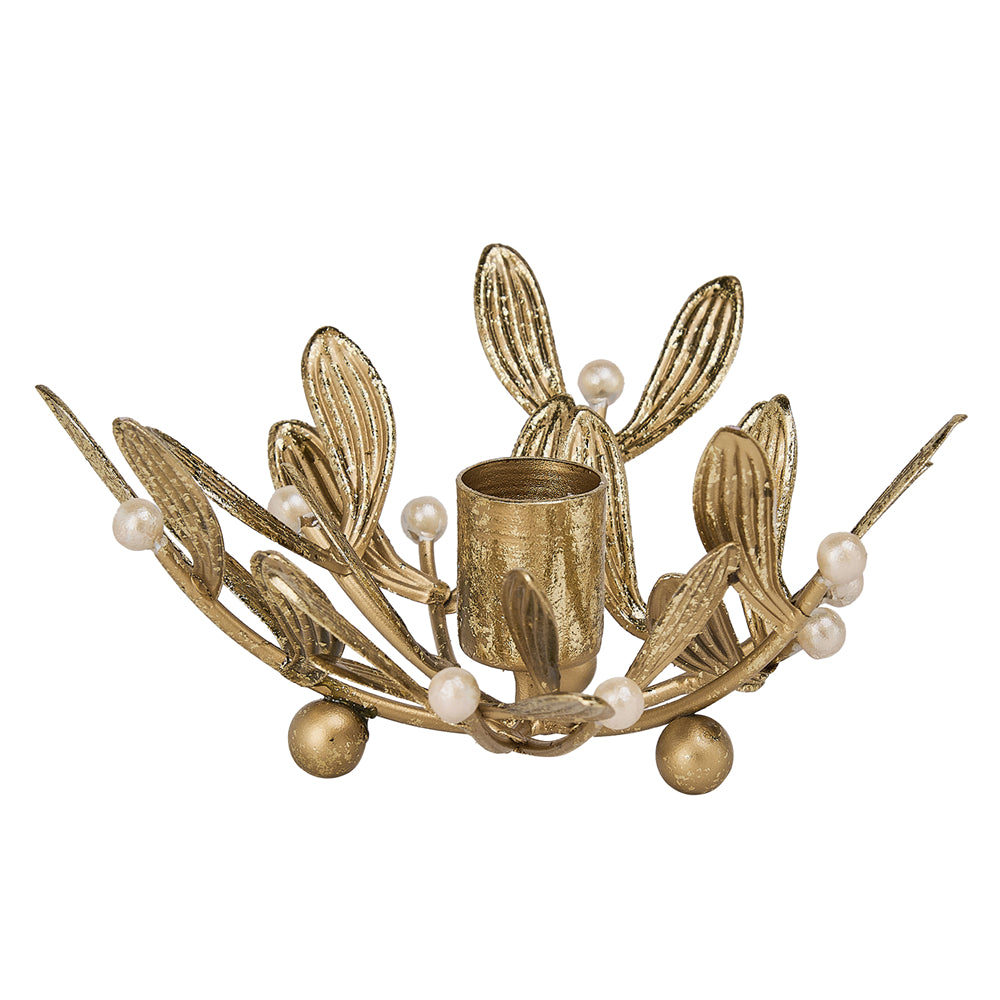 A gold-toned metal candle holder with leaf and branch motifs, small pearl-like beads, and a central cylindrical candle cup, shown on a plain white background.