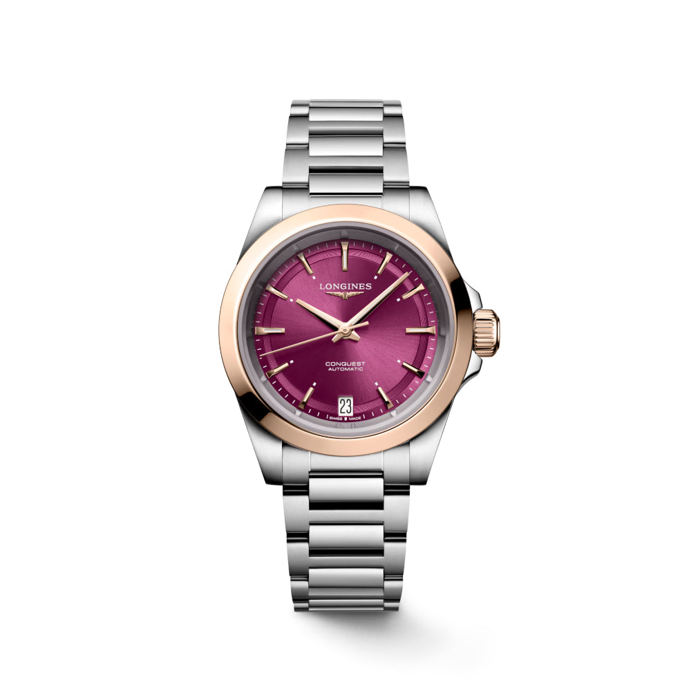 Watch with a silver and rose gold design on a white background