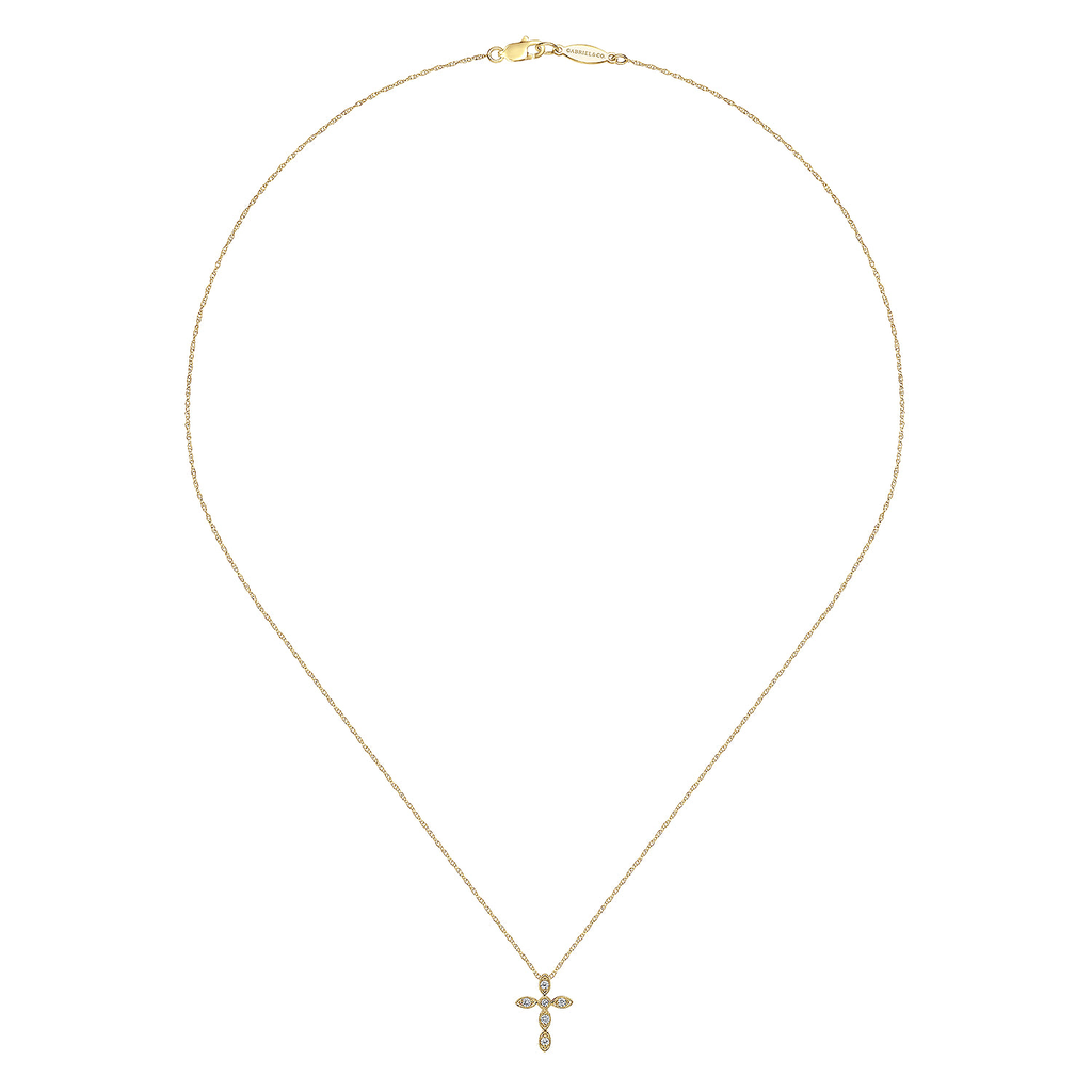 Gold necklace with a cross pendant on a white background