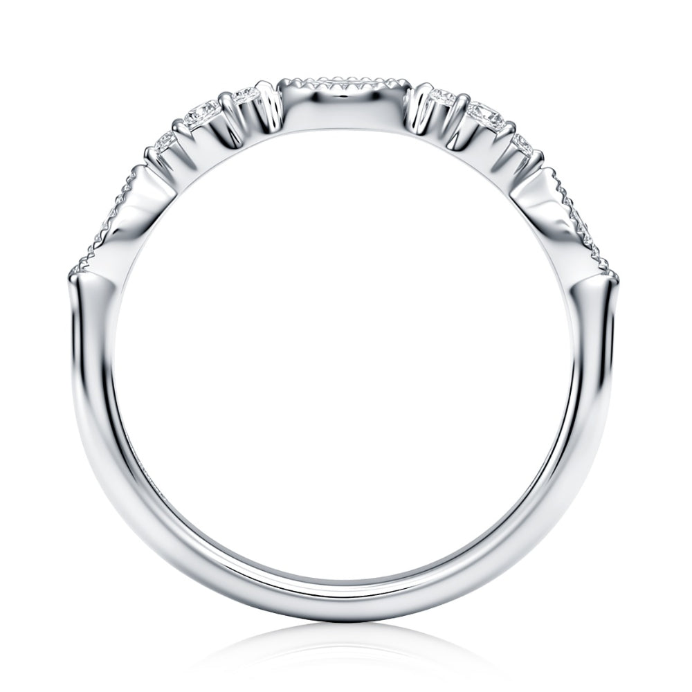 A silver-toned ring shown from the underside, featuring a wide band with a textured, fluted outer edge and a row of small clear stones along the top. The ring is photographed on a clean white background with a subtle reflection below.