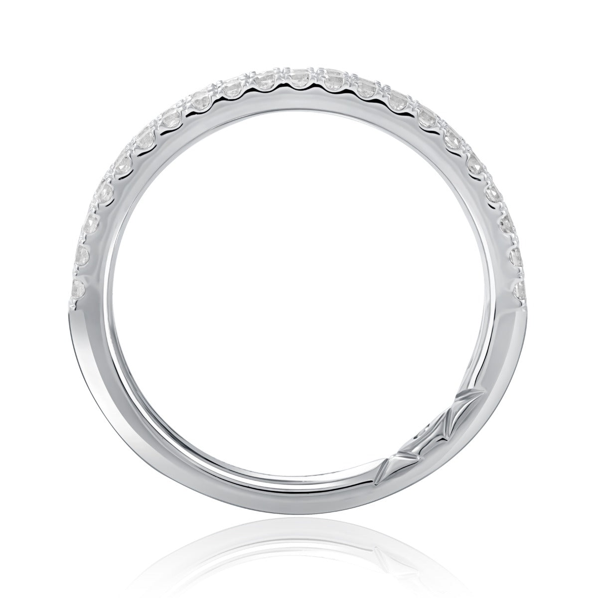 A silver ring with a textured, diamond-set outer band and a smooth inner band, shown on a clean white background with a subtle reflection.